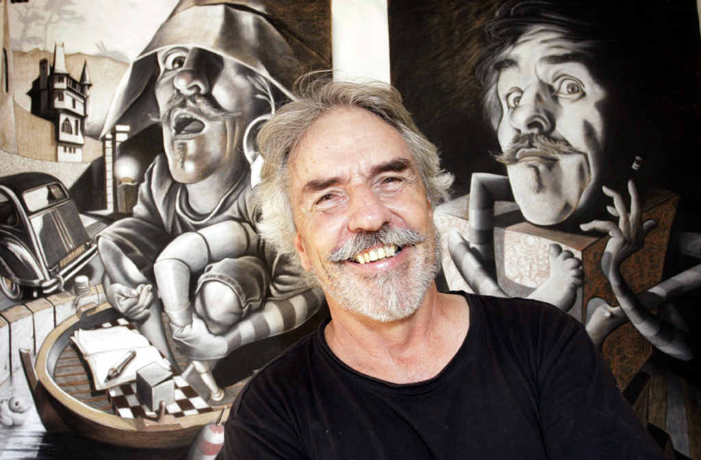 HERE’S LOOKING AT YOU: Woodford art teacher Peter Hollard with some of his self portraits. HERE’S LOOKING AT YOU: Woodford art teacher Peter Hollard with some of his self portraits.